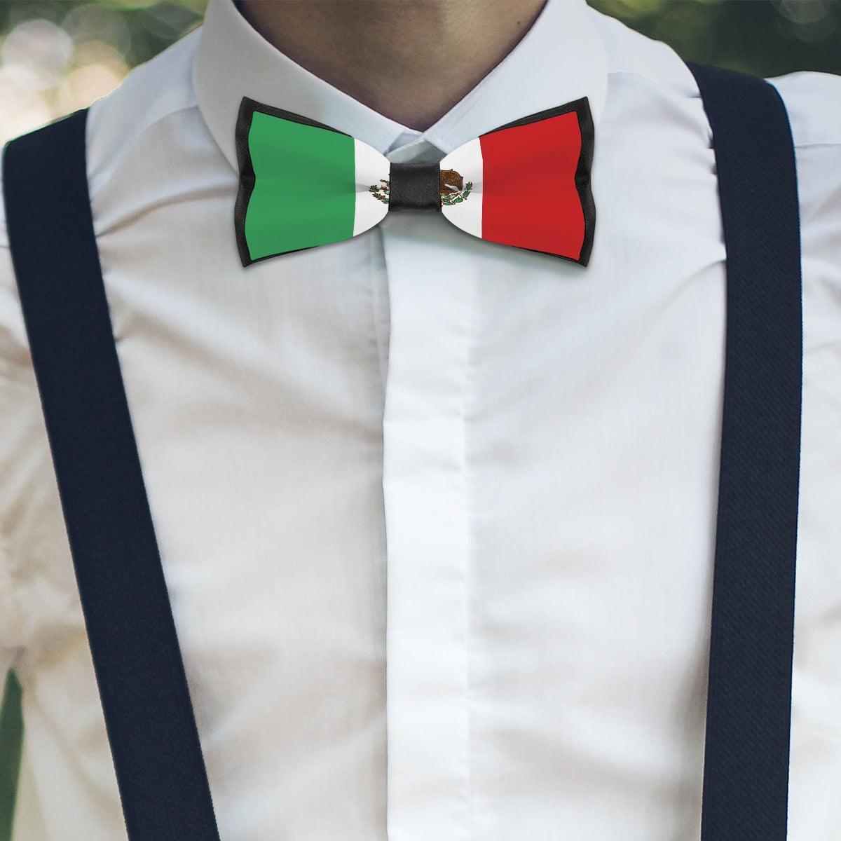 Man wearing [Brand] bow tie with Mexican flag design.