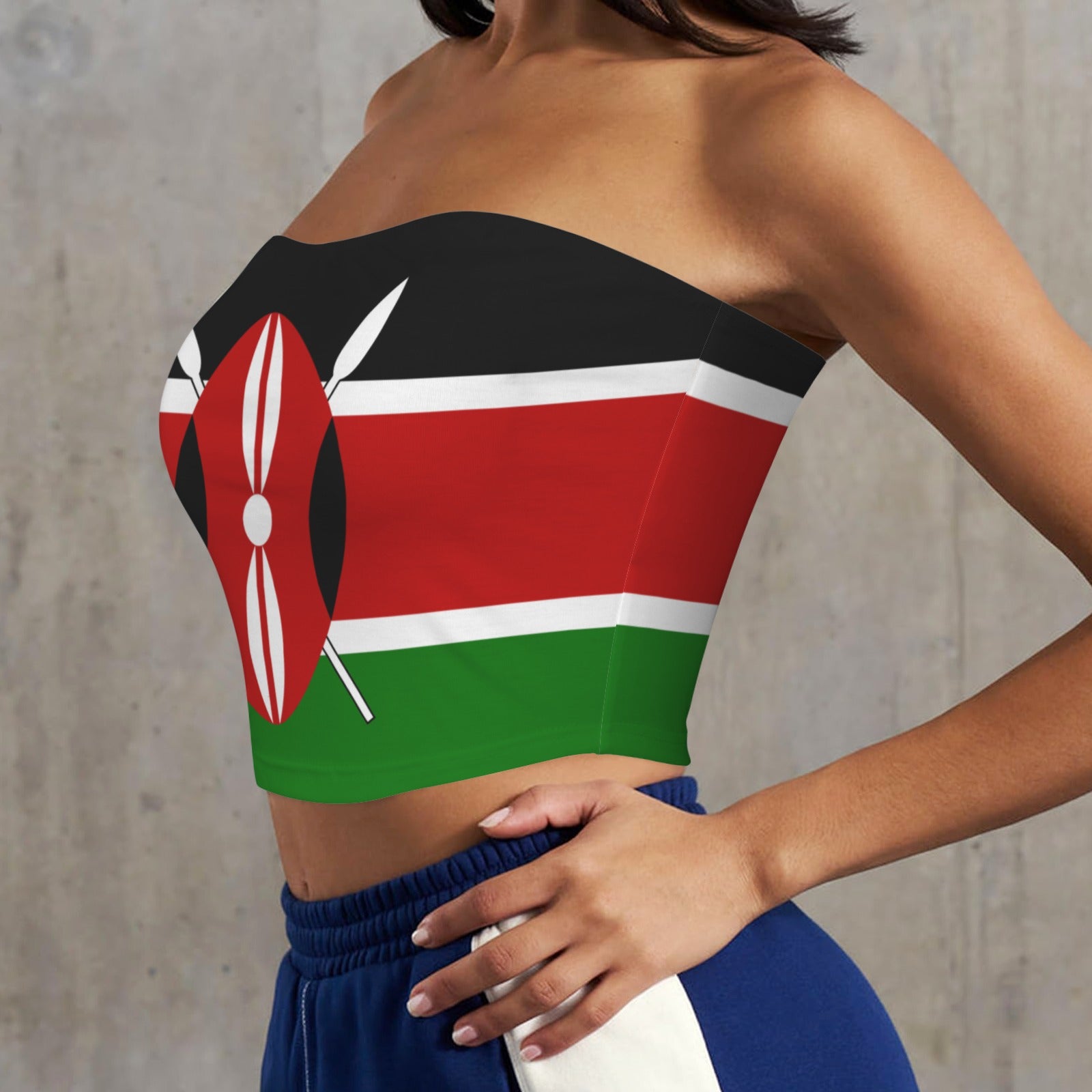 Woman wearing tube top with [Brand] Kenyan flag design.