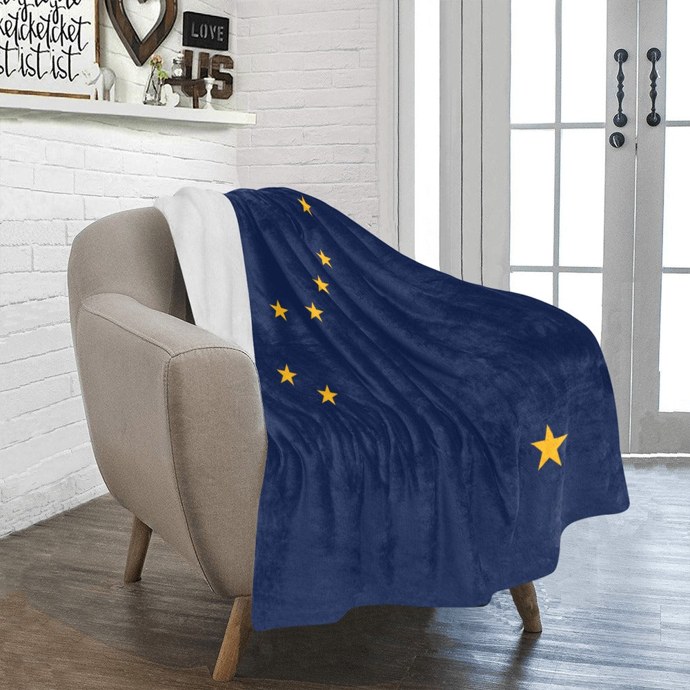 [Luv My Flag] navy blanket with yellow star design.