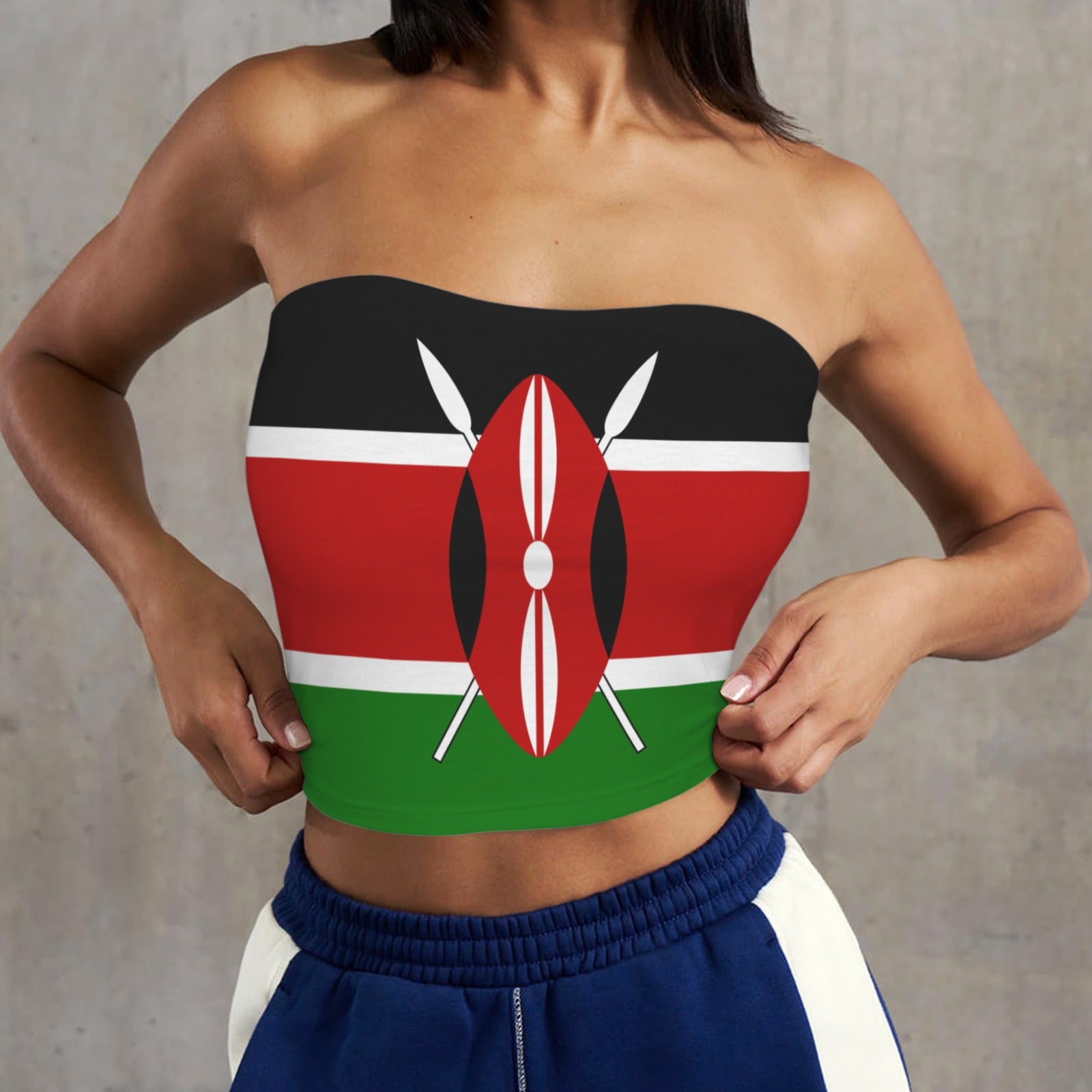[Brand] top featuring Kenyan flag design, worn by model.
