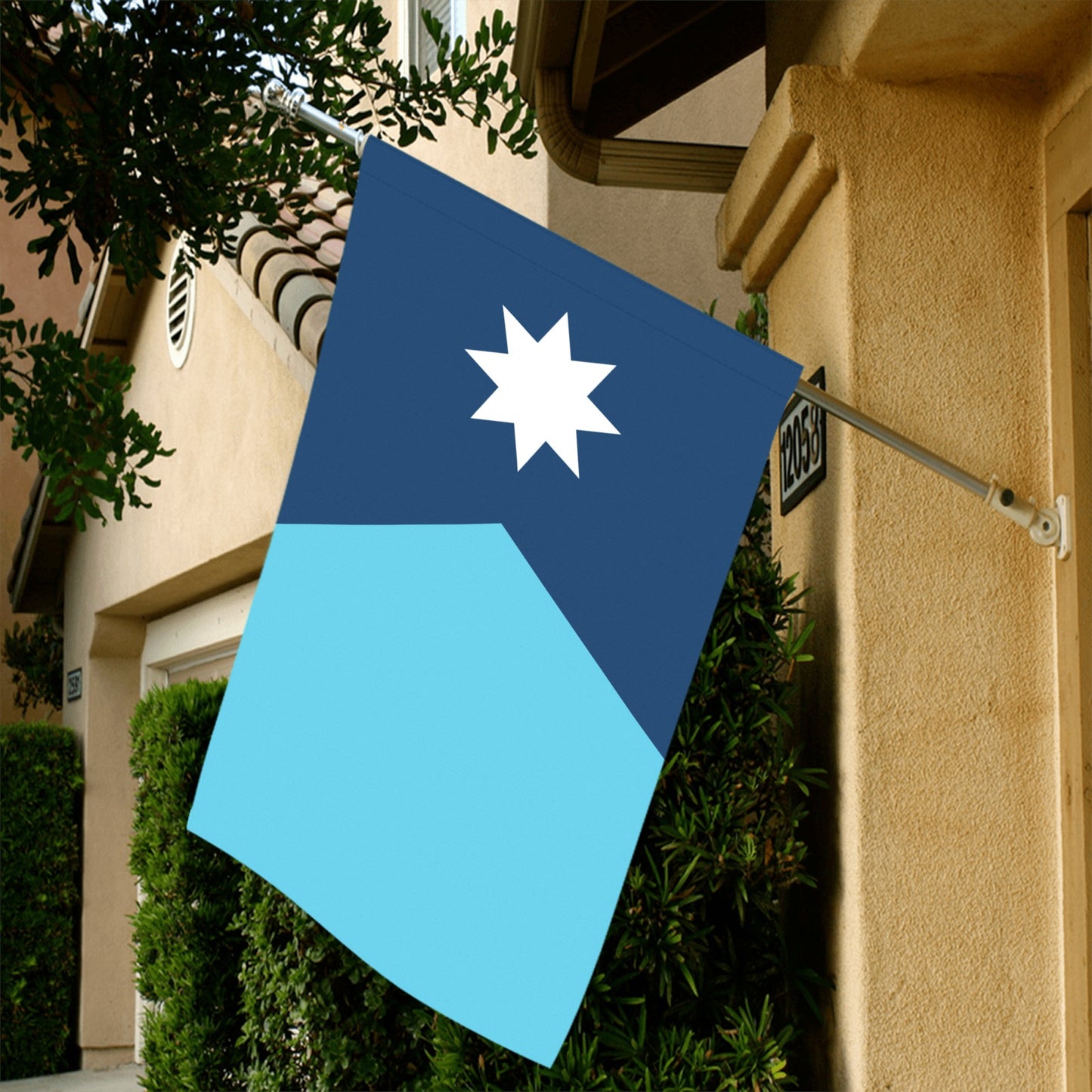 Luv My Flag blue design hung on suburban house.