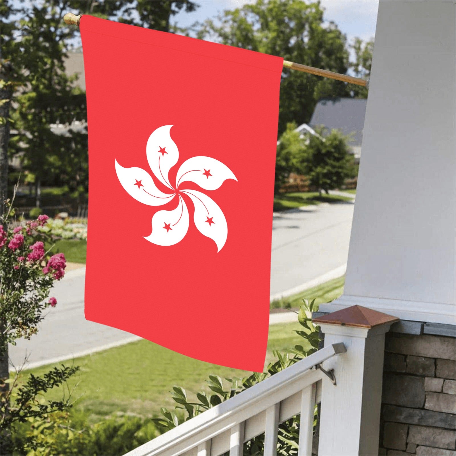 Red Hong Kong flag displayed outside house by Luv My Flag.