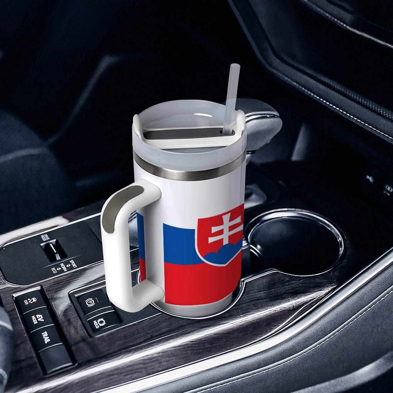 [Brand] travel mug with Slovakia flag in car holder.