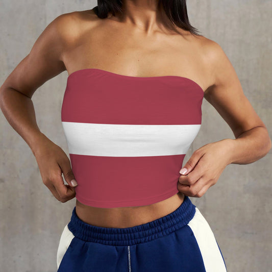 Woman wearing [Brand] striped tube top and blue pants.