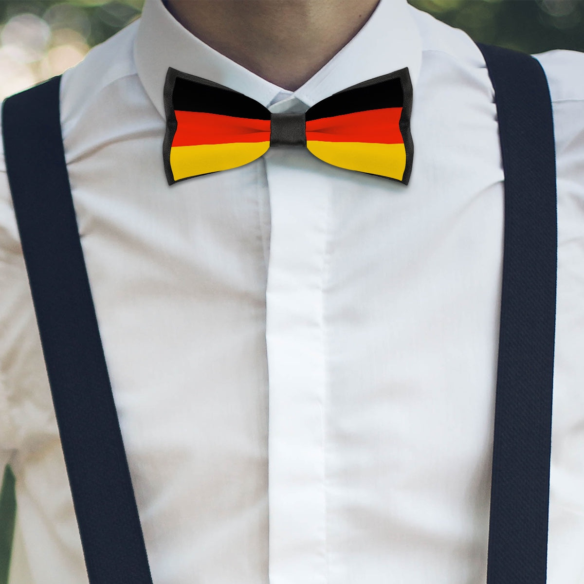 White shirt with [Brand] bow tie, Germany flag design, suspenders.