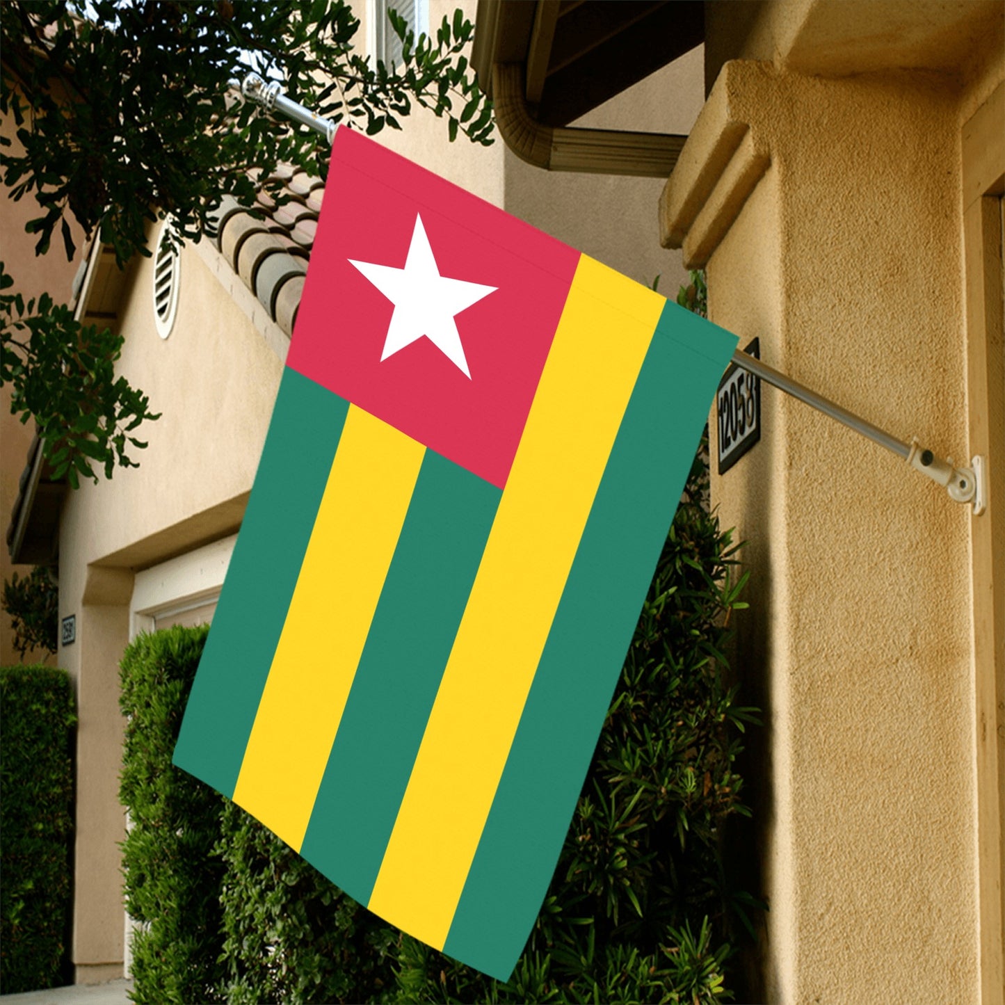 [Luv My Flag] Togo flag displayed outside a house.