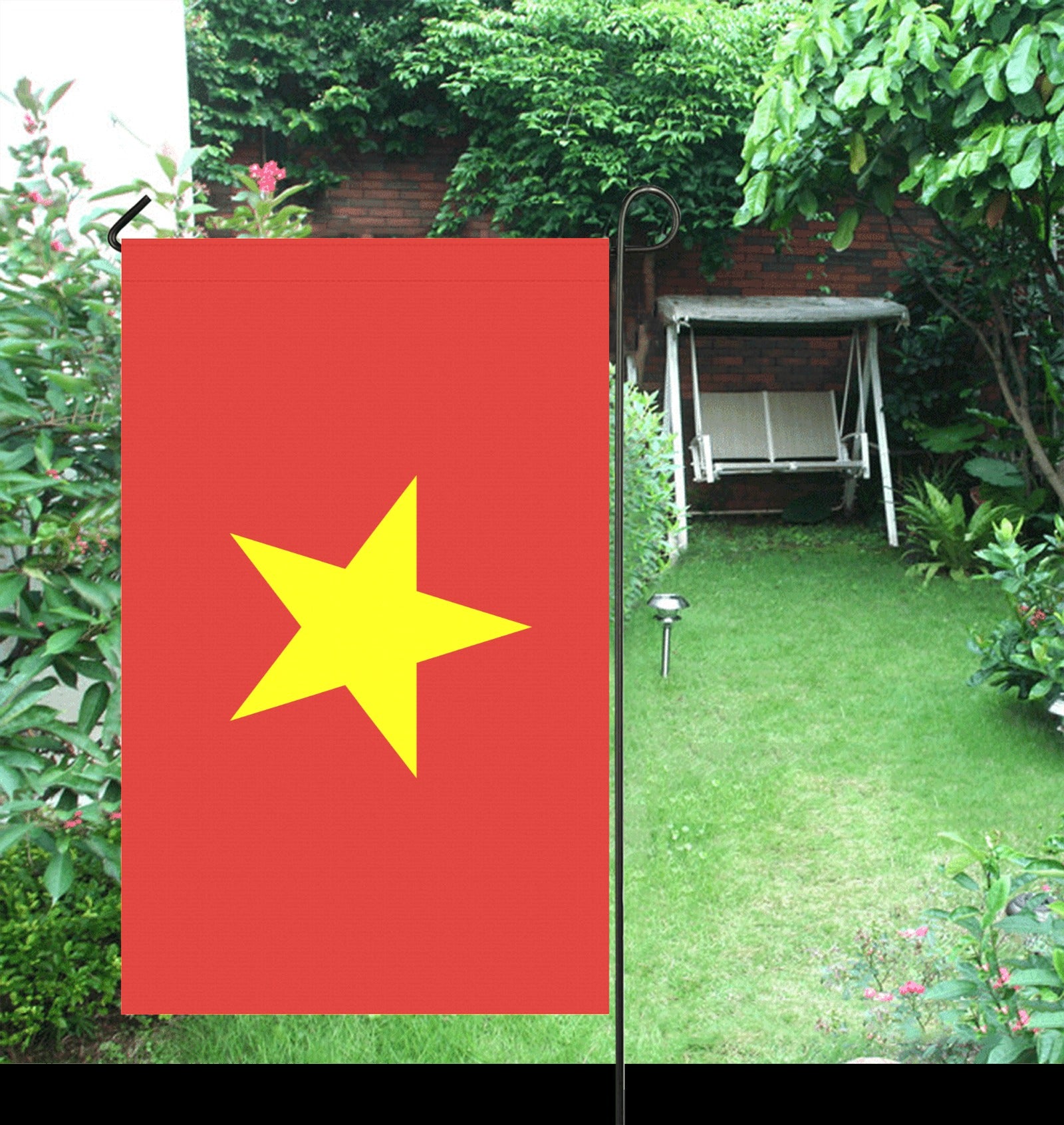 Red flag with yellow star by Luv My Flag. Garden.
