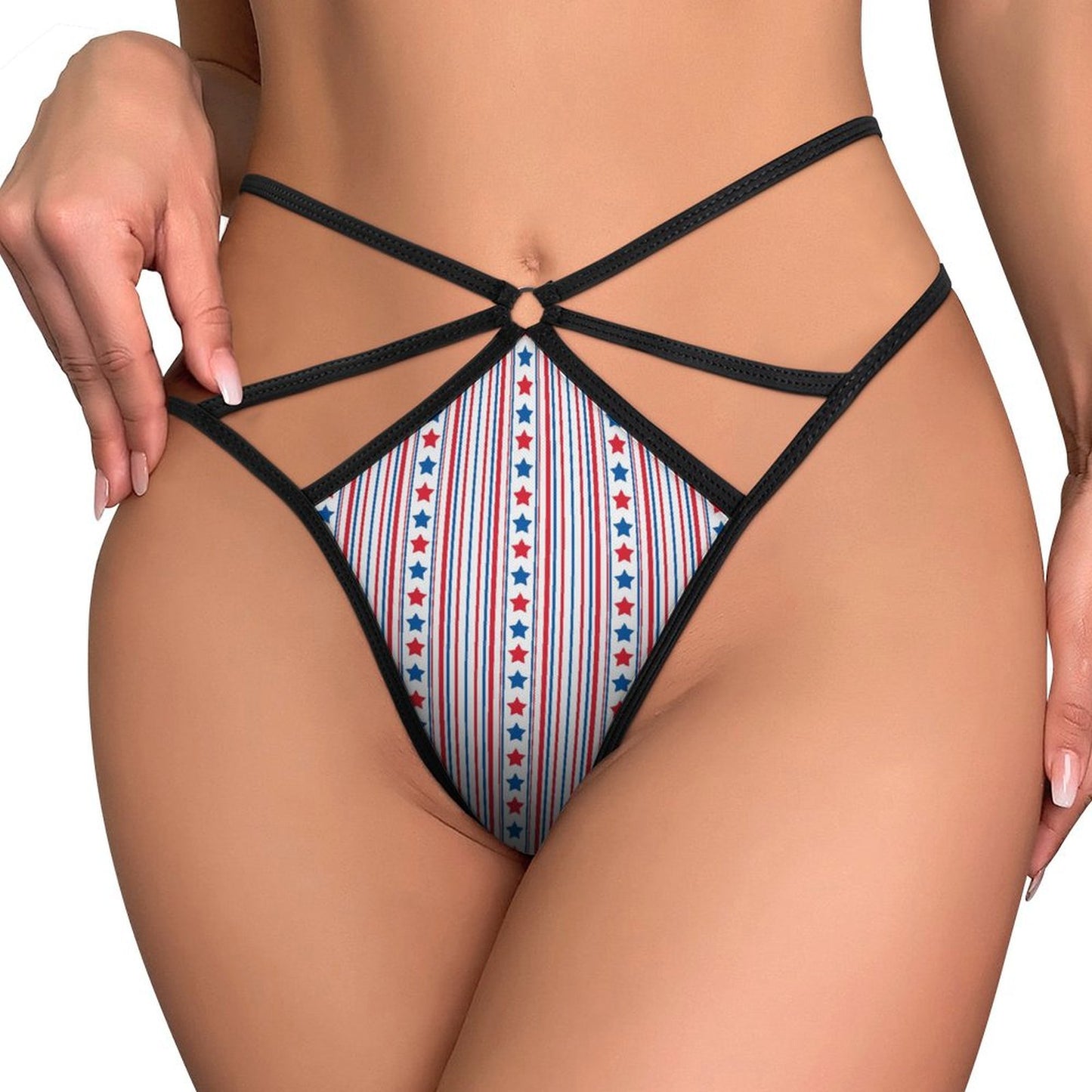 Black strappy lingerie with star designs by [Brand].