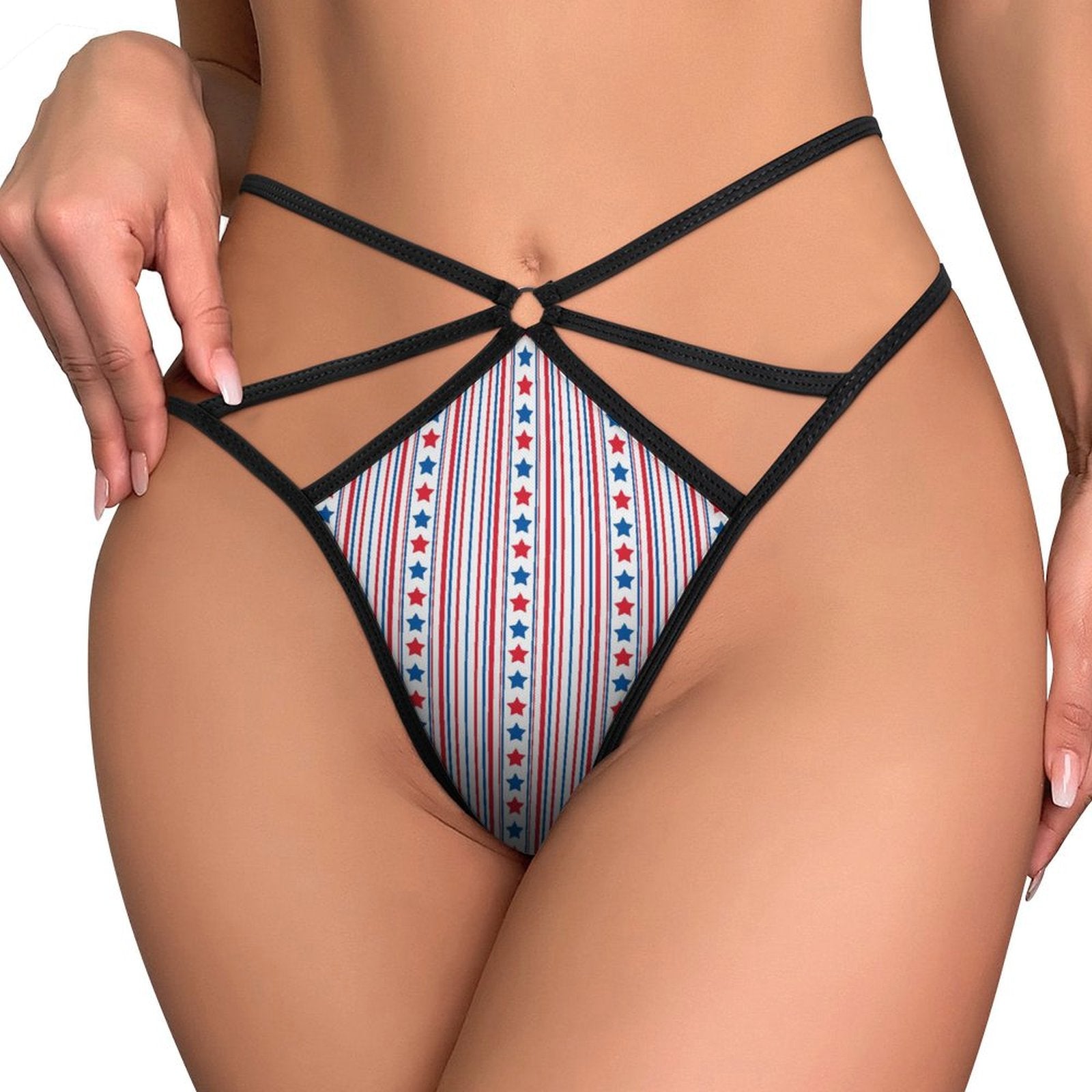 Black strappy lingerie with star designs by [Brand].