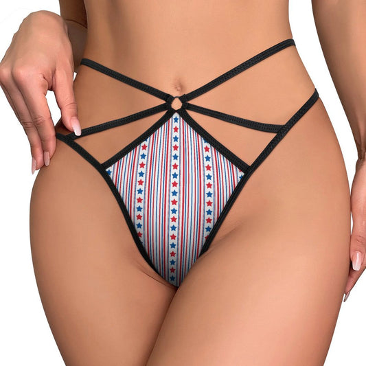 Black strappy lingerie with star designs by [Brand].