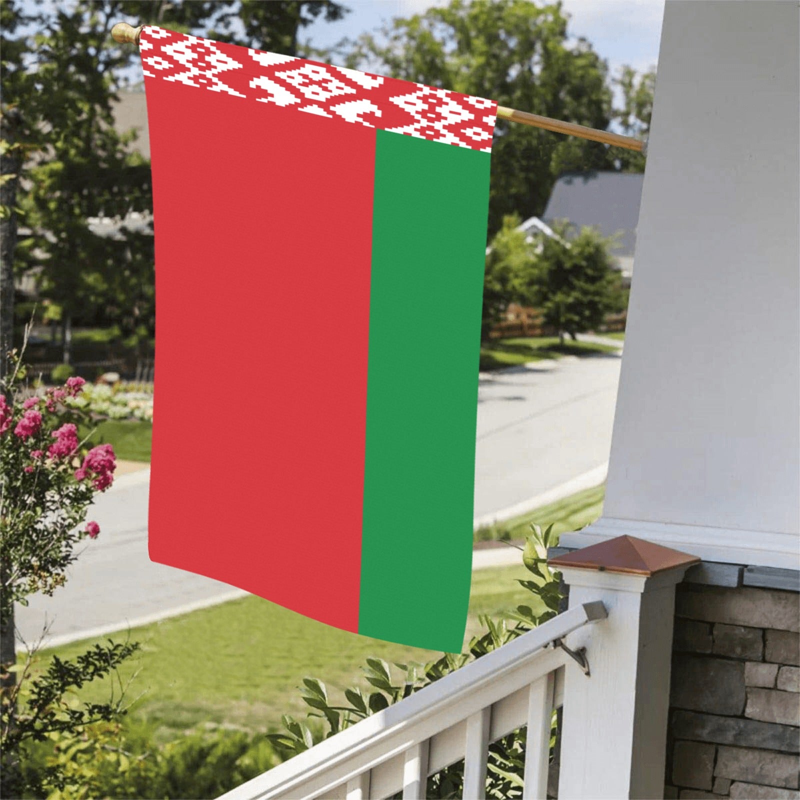 Luv My Flag's red-green flag displayed on porch.