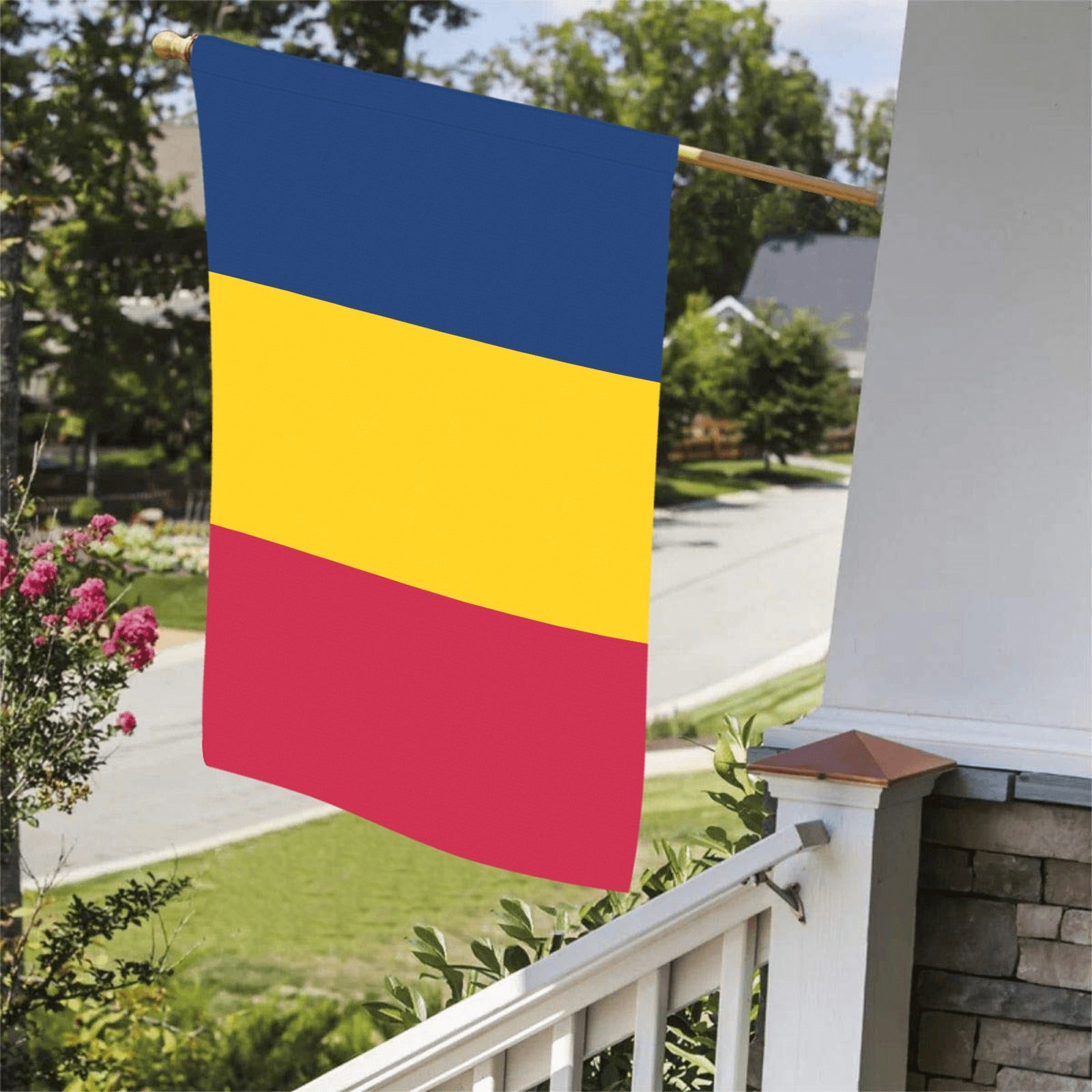 Luv My Flag tricolor blue, yellow, red flag displayed outside.