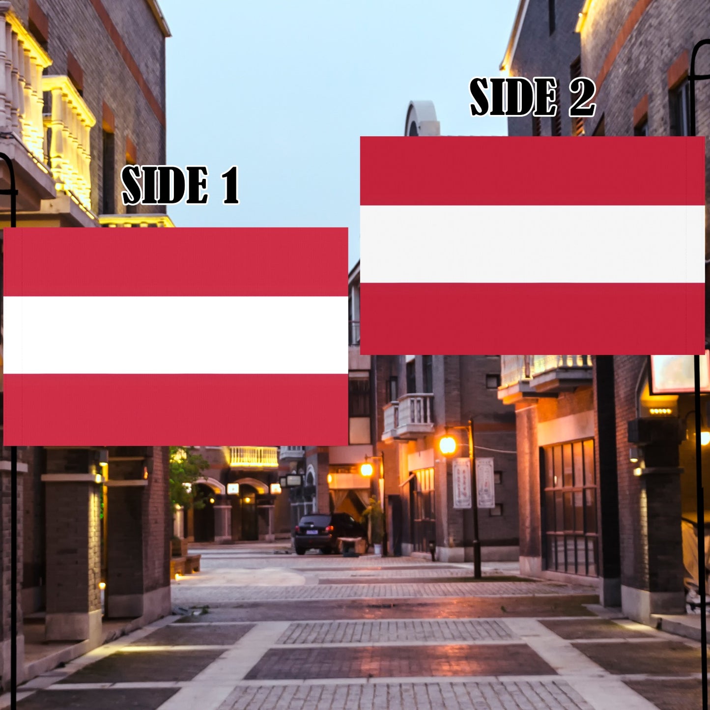 Two Luv My Flag banners on a cobblestone street.