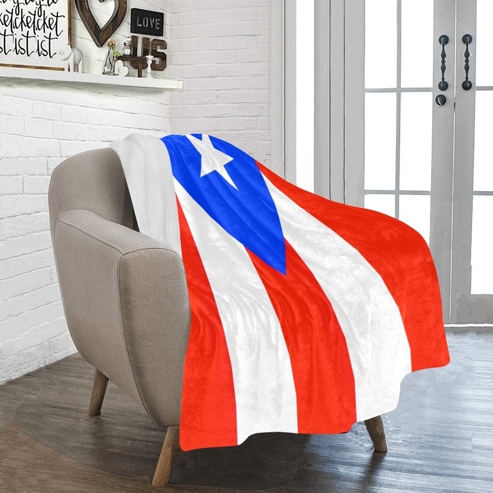 [Luv My Flag] blanket with Puerto Rican flag on chair.