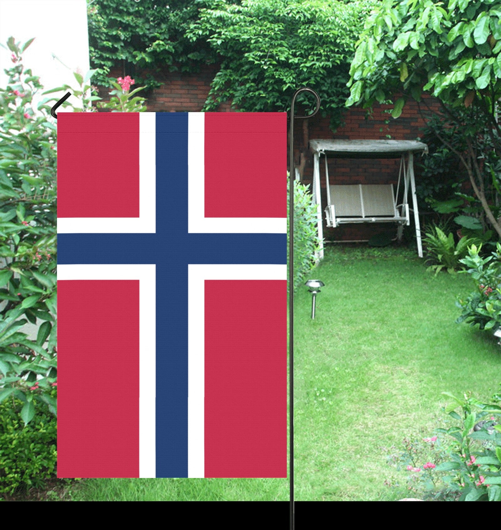 [Luv My Flag] Norwegian flag displayed in a lush garden.
