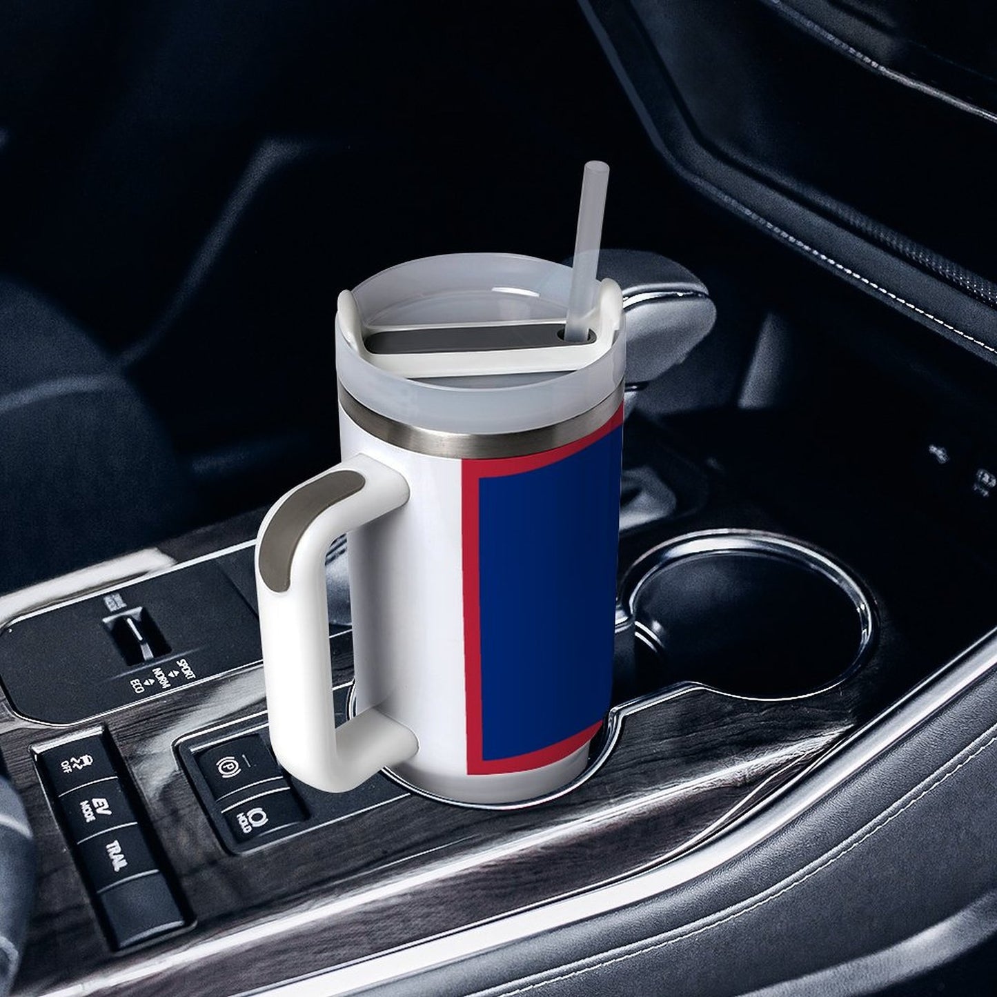 [Brand] white travel mug with straw in car holder.