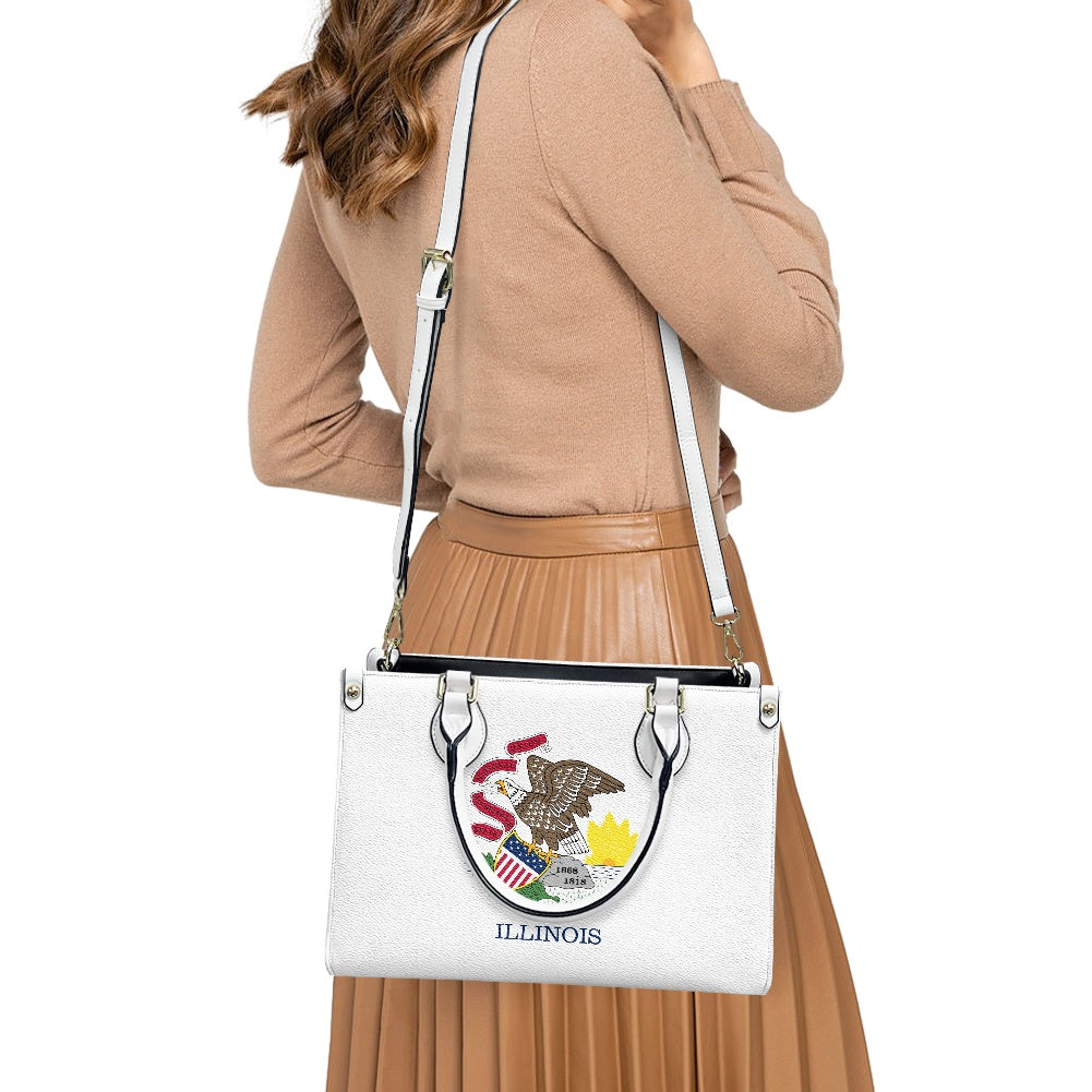 Woman carrying [Brand] Illinois-themed tote bag, wearing beige outfit.