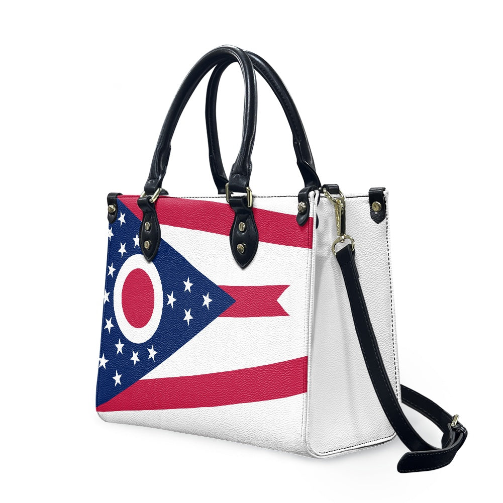 [Brand] handbag with Ohio flag design and black straps.