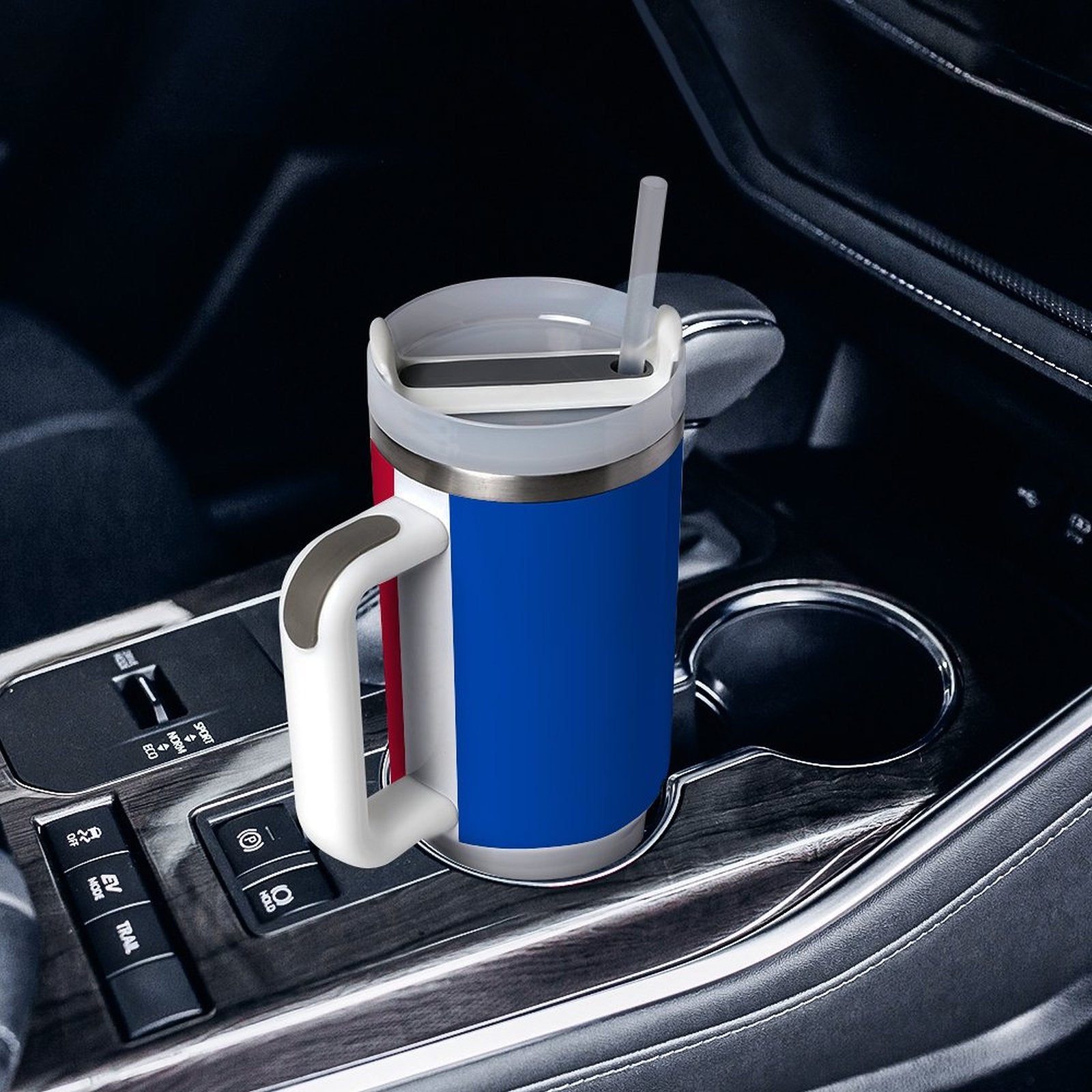 [Brand] insulated mug with straw in car cup holder.