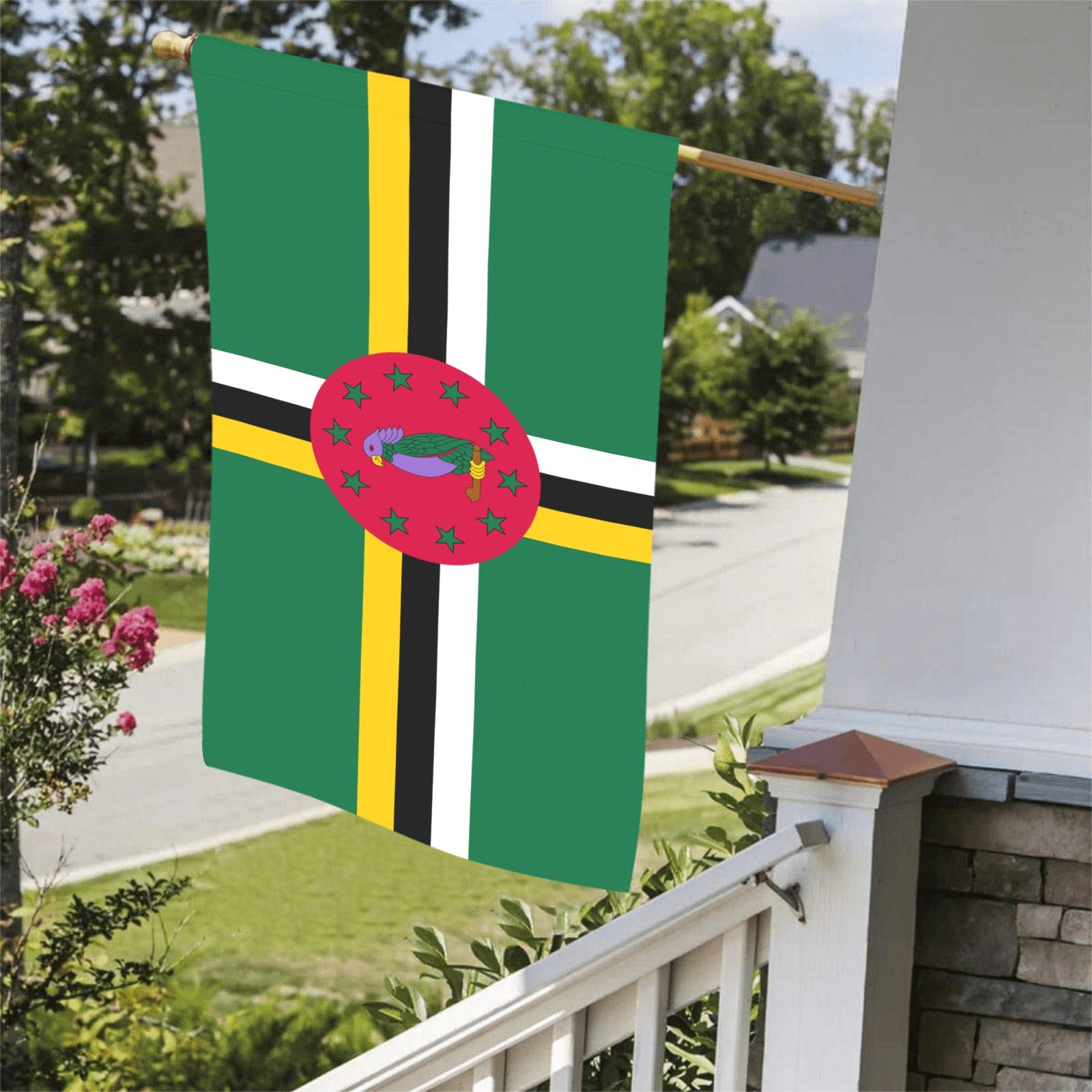 Luv My Flag Dominica flag displayed on a porch.