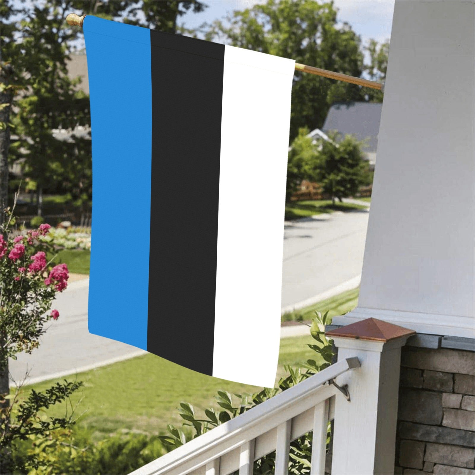 Luv My Flag's Estonian flag hanging on a porch.
