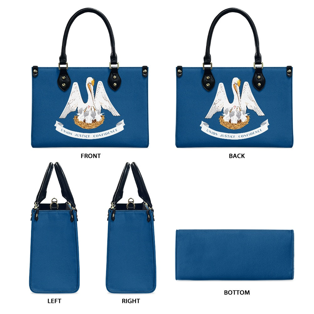 Blue handbag by [Brand] featuring a pelican crest design.