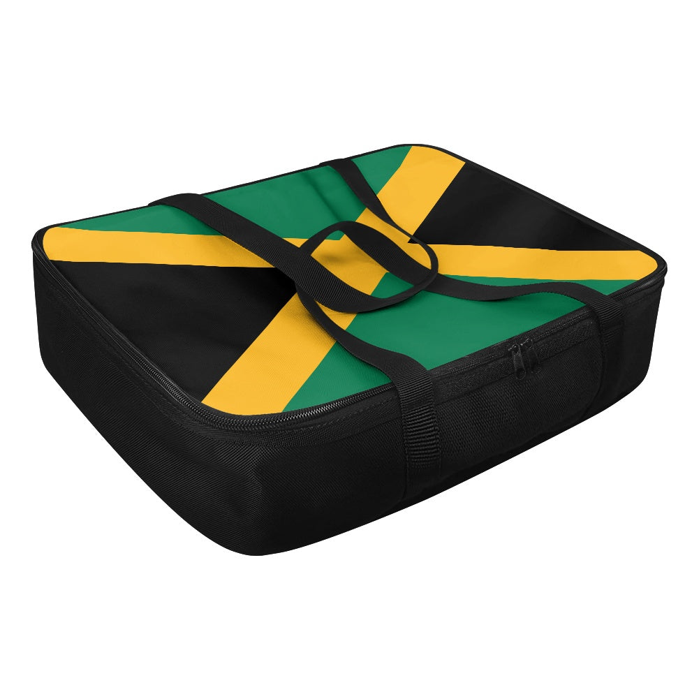[Brand] bag featuring Jamaican flag design with zippered closure.