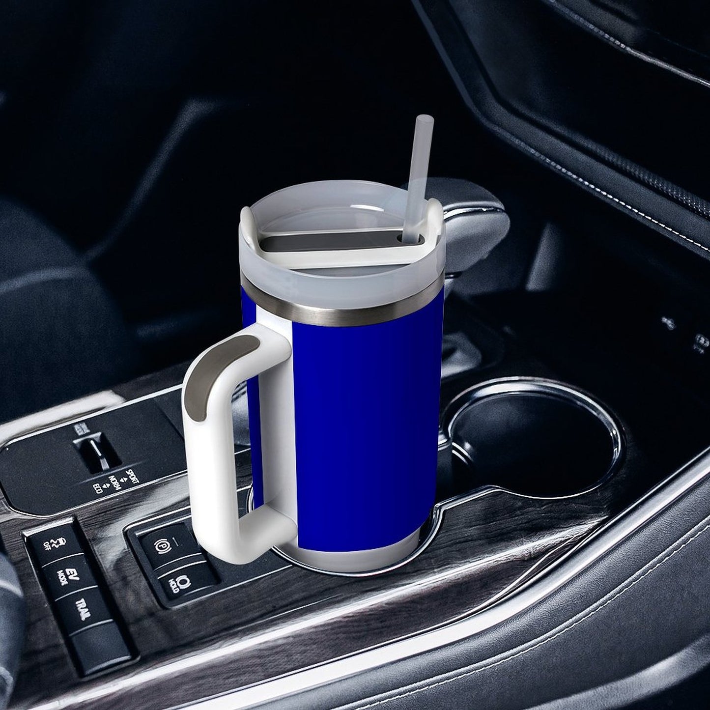 Blue [Brand] travel mug with straw, car cup holder.