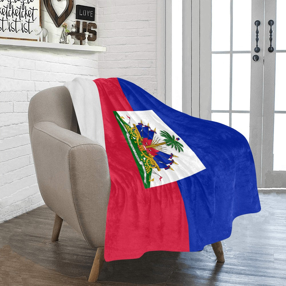 Cozy chair draped with Luv My Flag Haiti blanket.