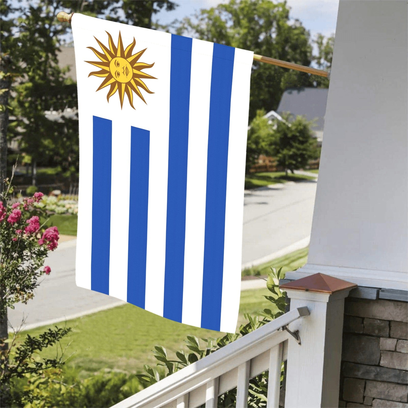 [Luv My Flag] Uruguayan flag hanging outside on sunny day.