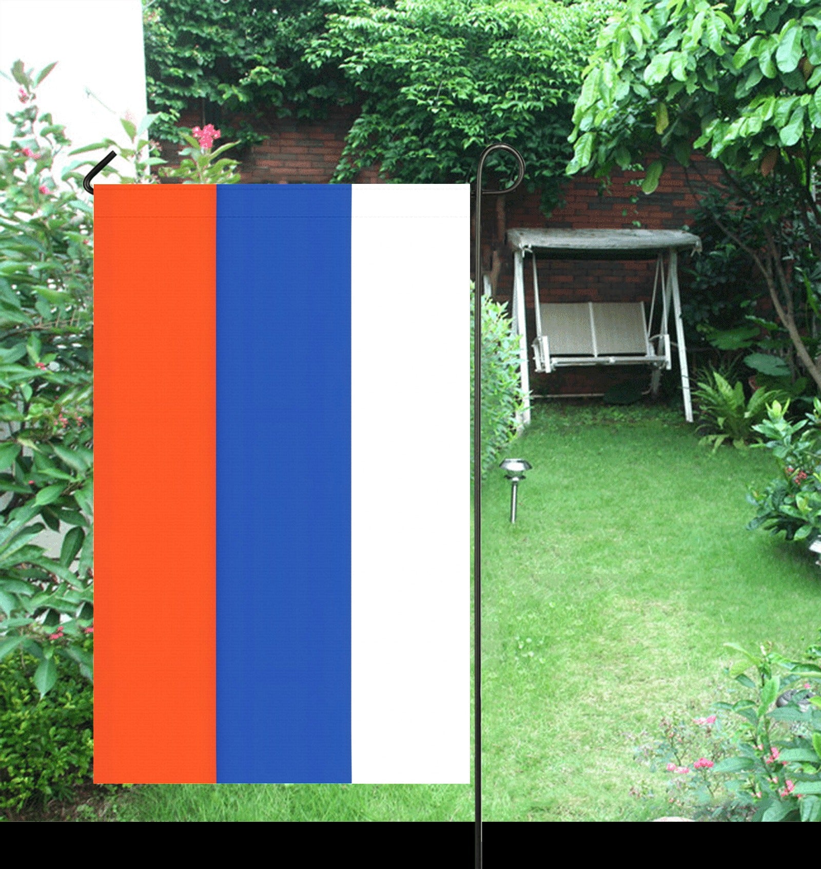 Luv My Flag garden, red-blue-white flag, green background.