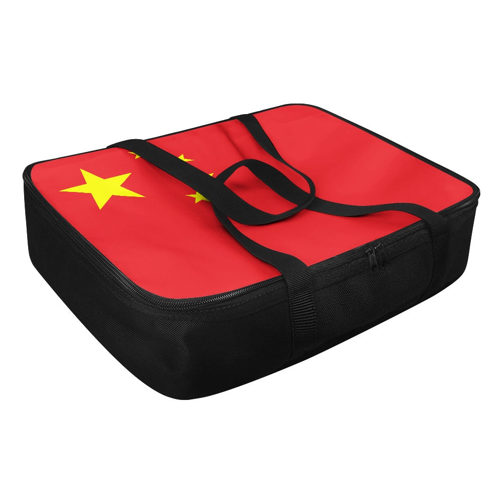 [Brand] red and black bag featuring yellow star design.