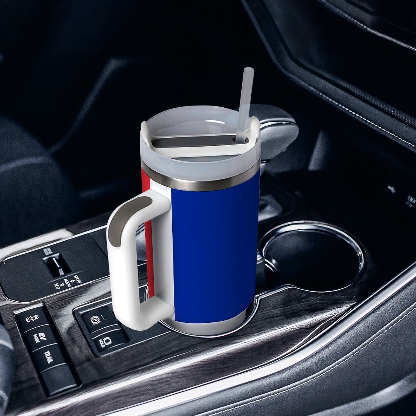 [Brand] insulated mug in car holder with blue exterior.