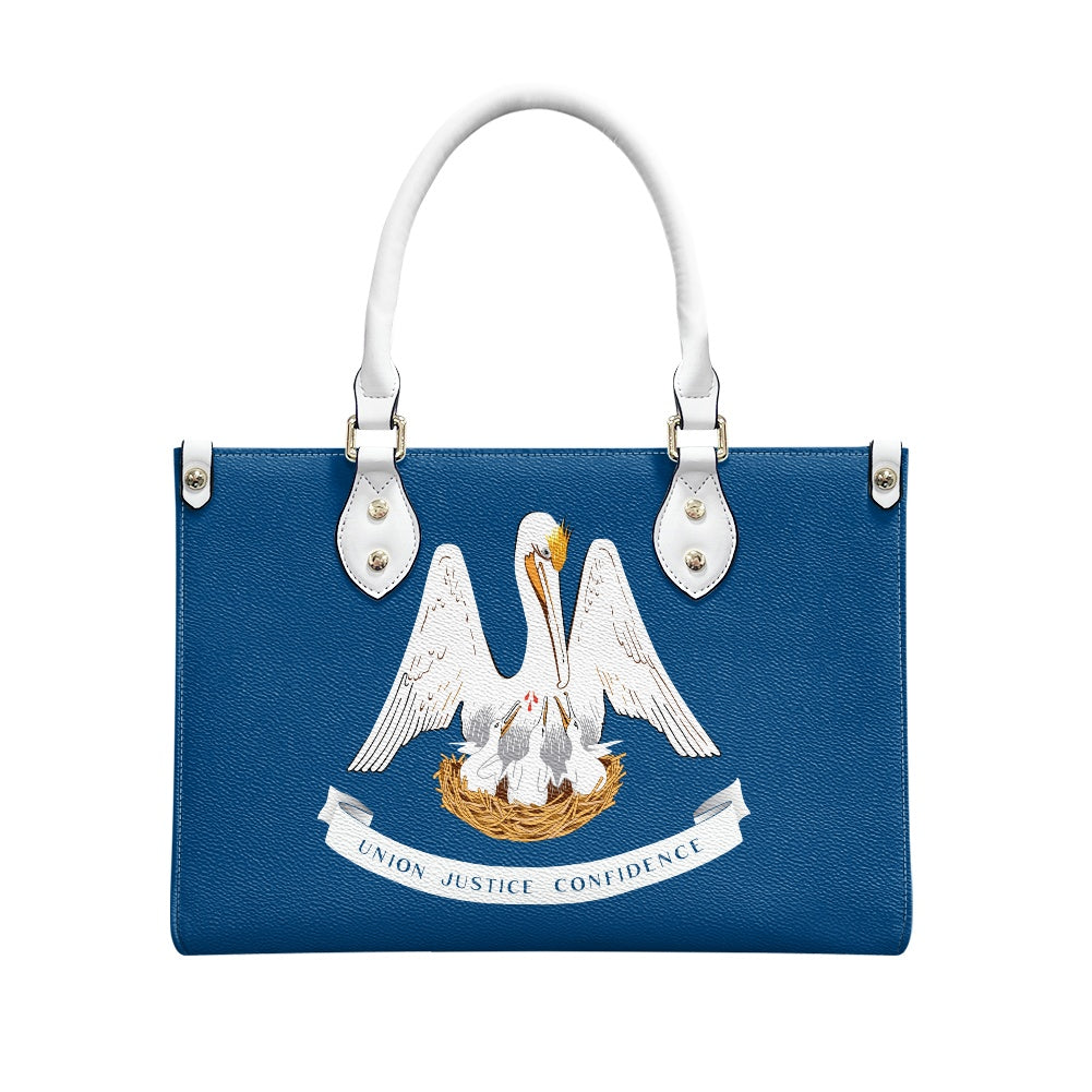 Blue handbag with embroidered pelican design, white handles, [Brand].