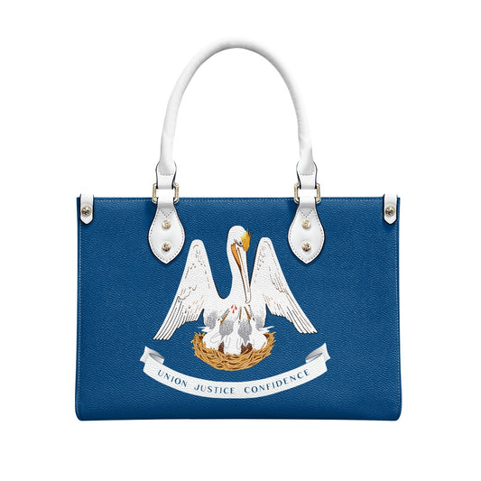 Blue handbag with embroidered pelican design, white handles, [Brand].