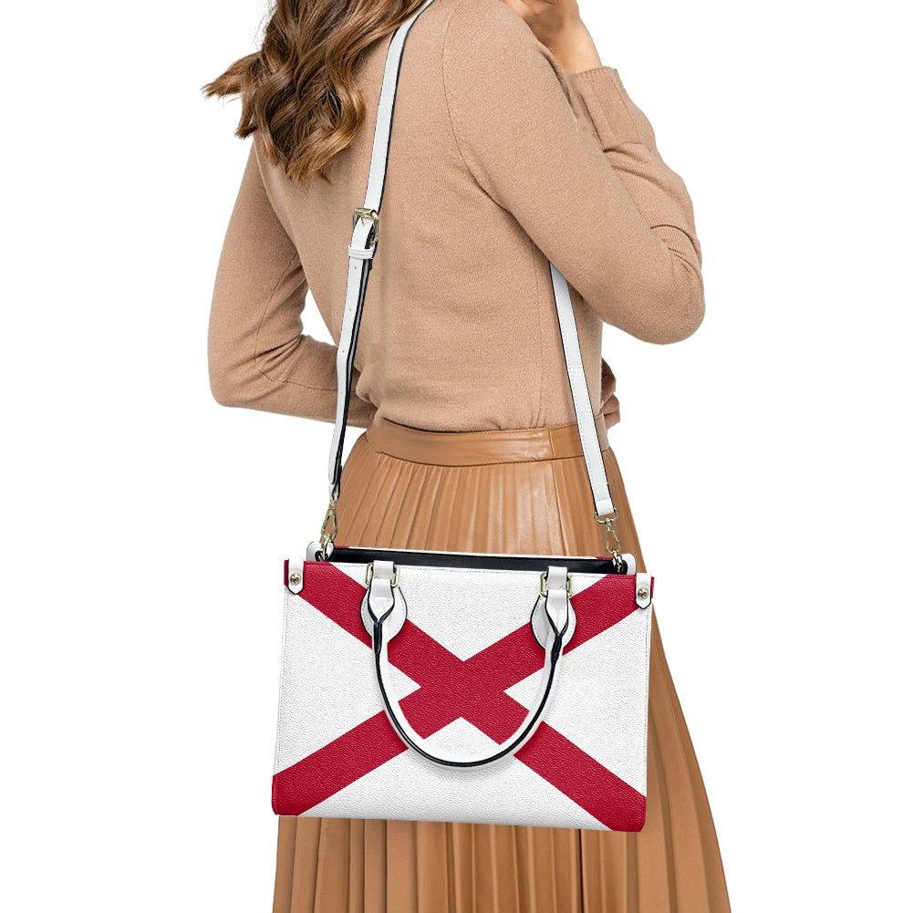 Woman carrying red-and-white [Brand] handbag, wearing beige outfit.