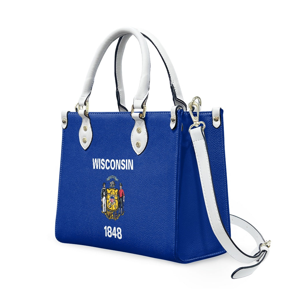 Blue handbag with Wisconsin state emblem, by [Brand].
