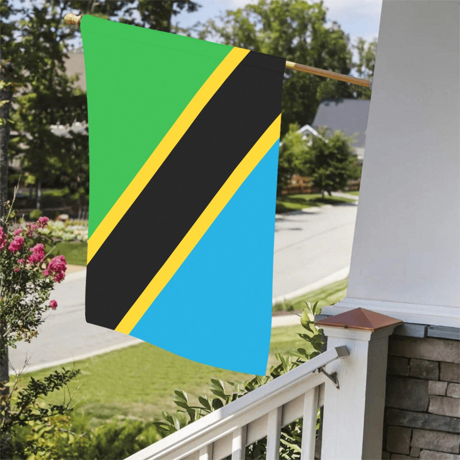 Tanzania flag on porch, sunny day, by Luv My Flag.