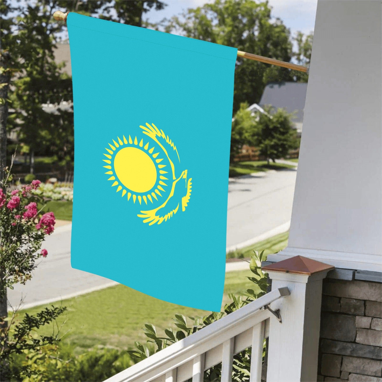 Luv My Flag displays bright teal and yellow flag outside.