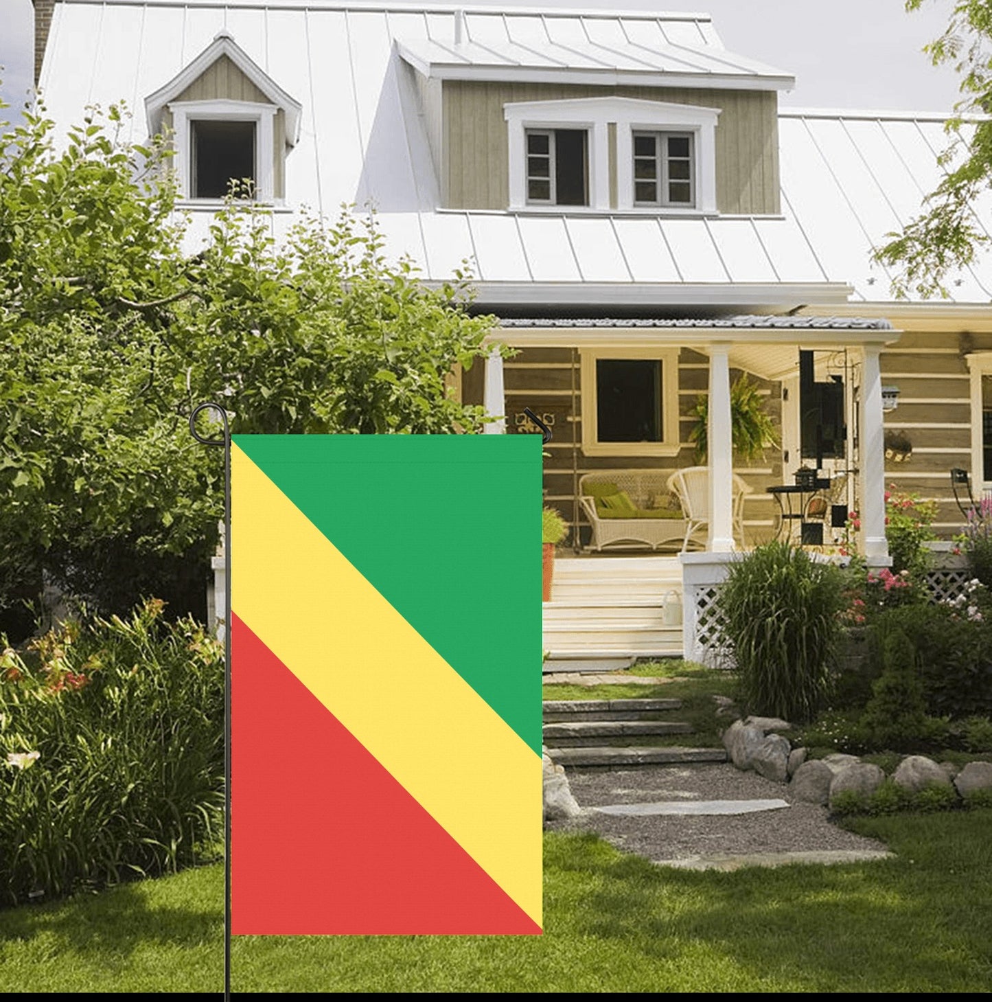 Luv My Flag garden flag with colorful design near house.