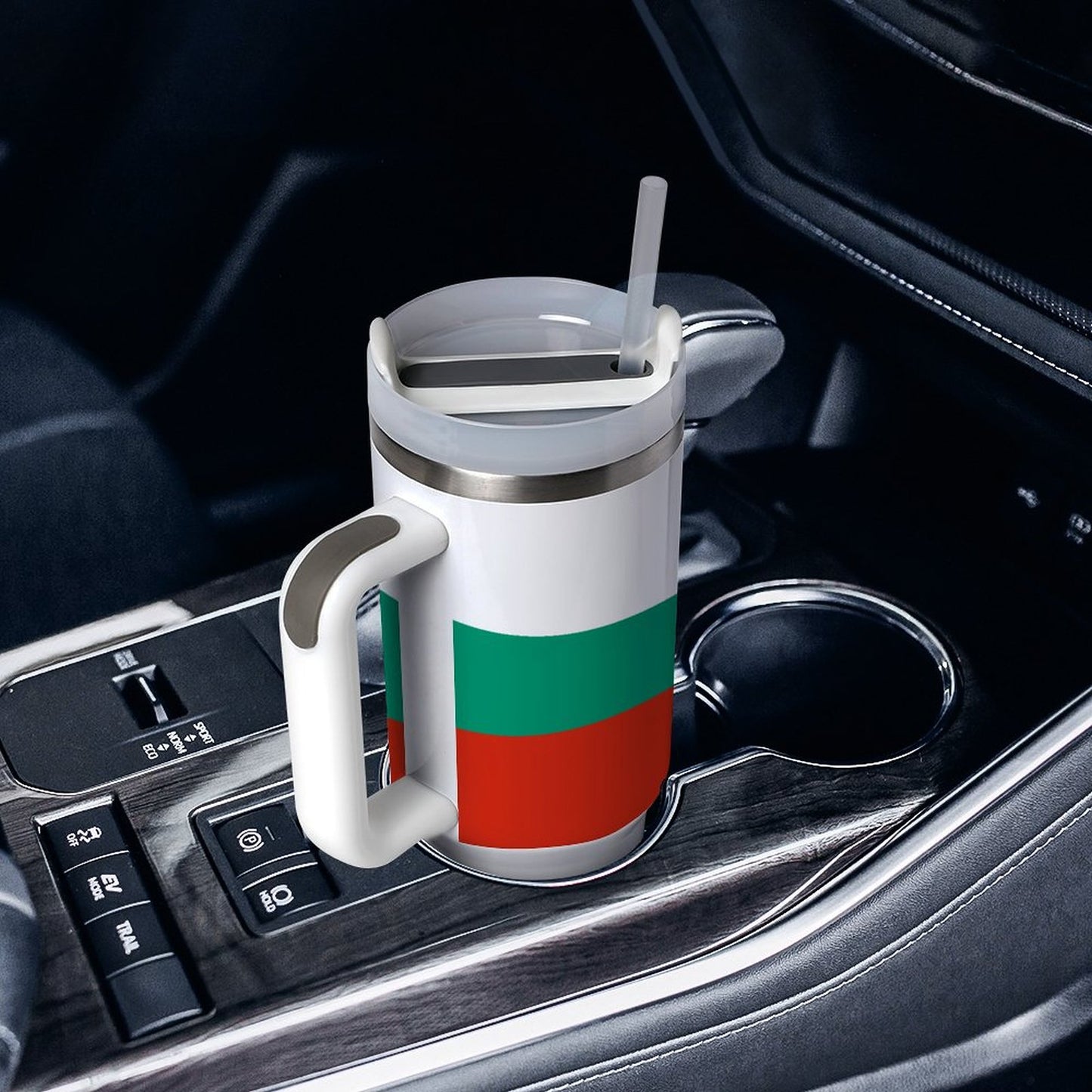 [Brand] mug with red-green stripes in car cup holder.
