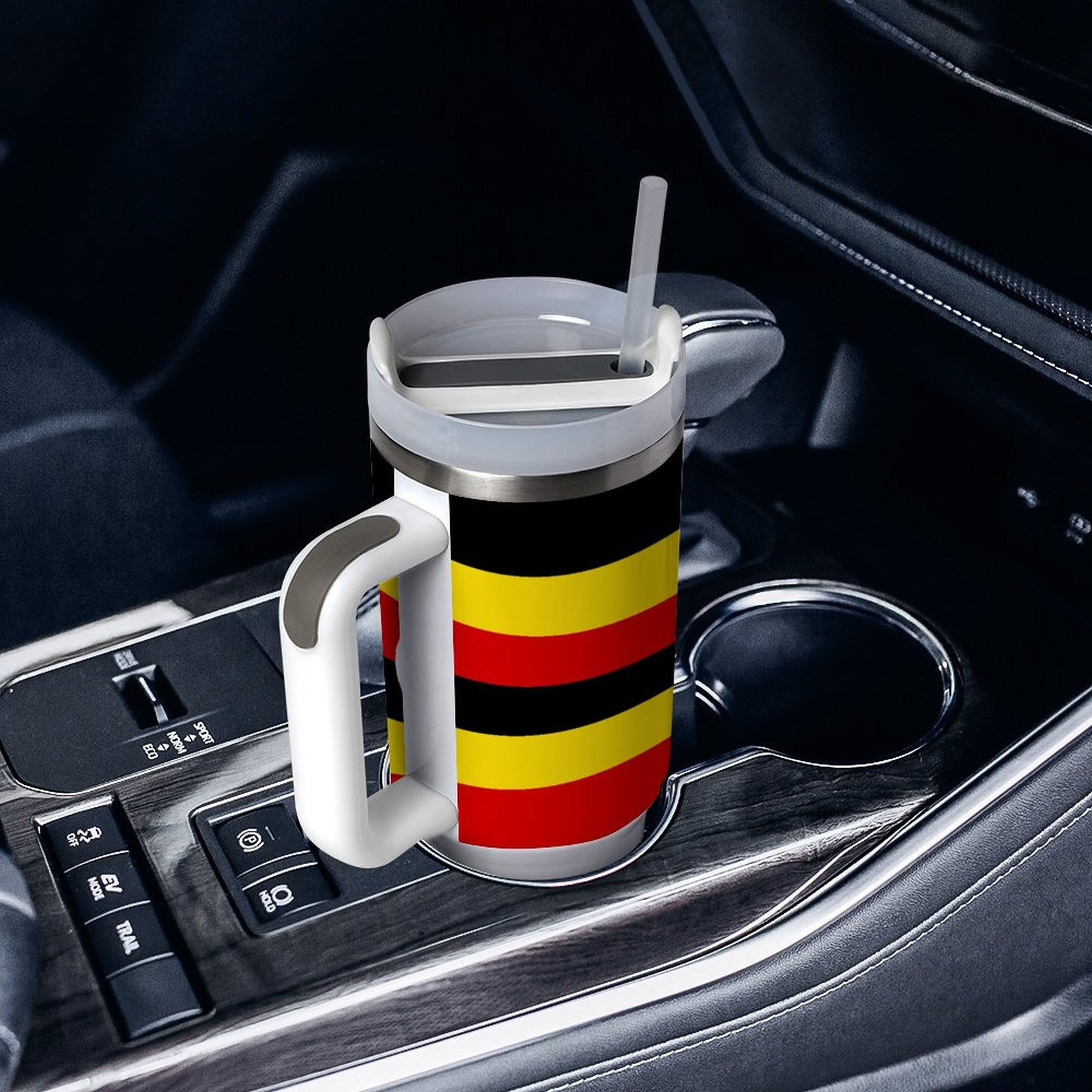 [Brand] travel mug with stripes in a car holder.