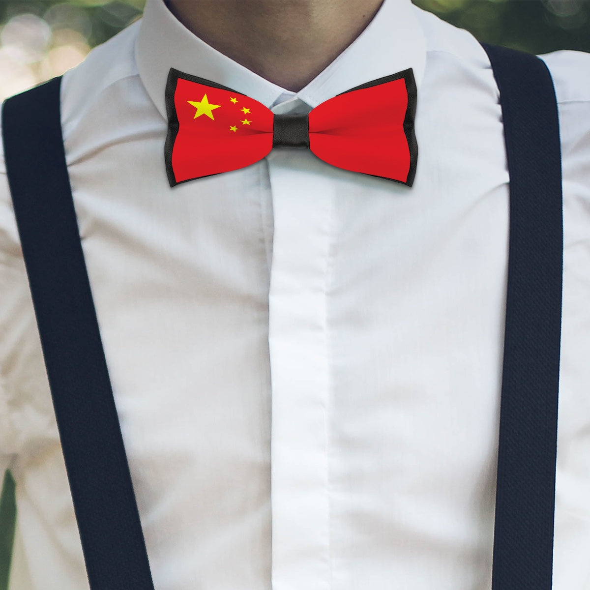 A person wears a [Brand] bowtie with China's flag.