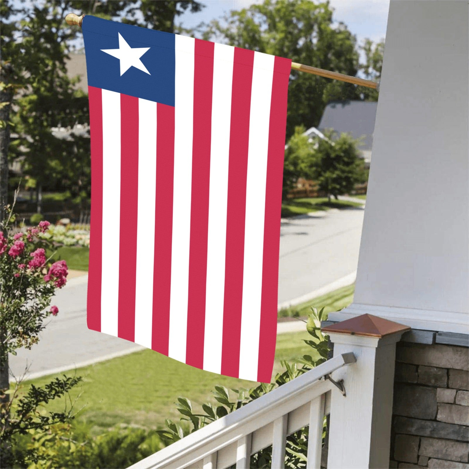 Luv My Flag displays Liberia flag on residential porch.