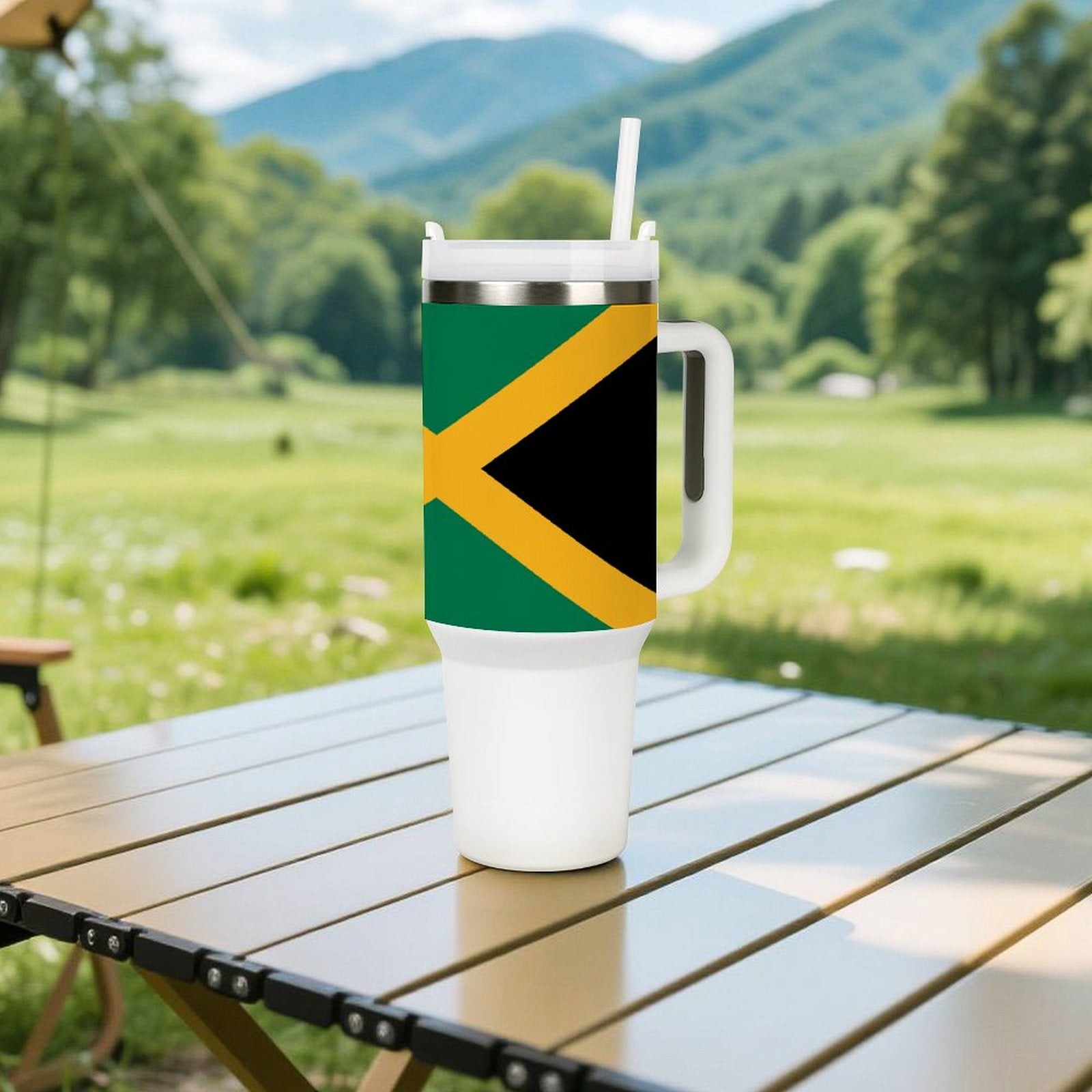 [Brand] mug with Jamaican flag design on outdoor table.