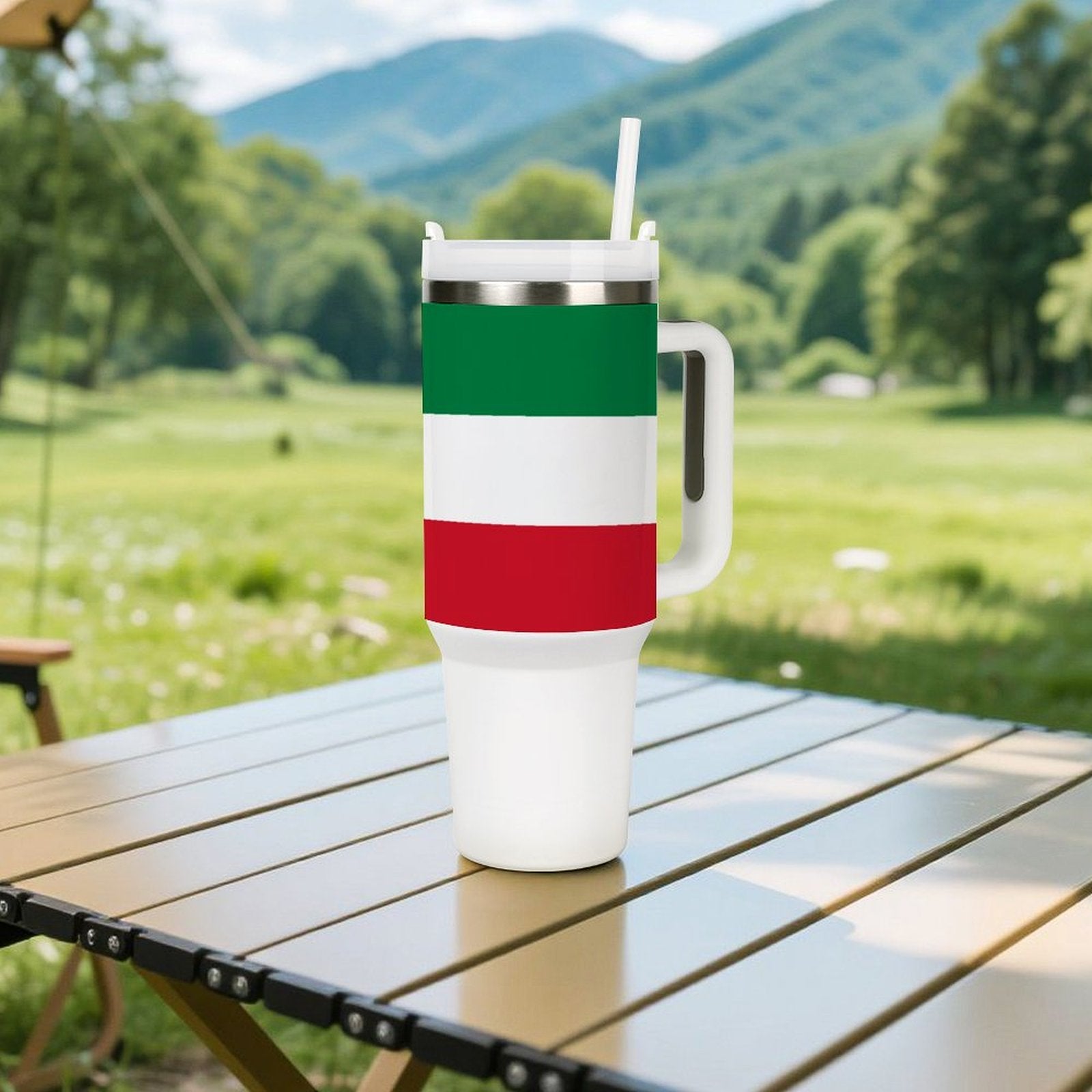 [Brand] tumbler with Italian flag design on outdoor table.