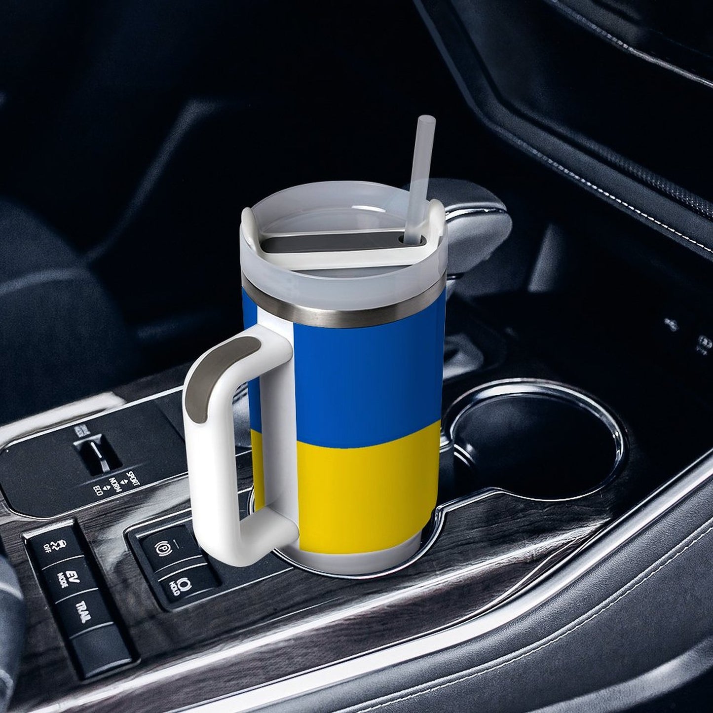 [Brand] insulated mug with straw in car cup holder.