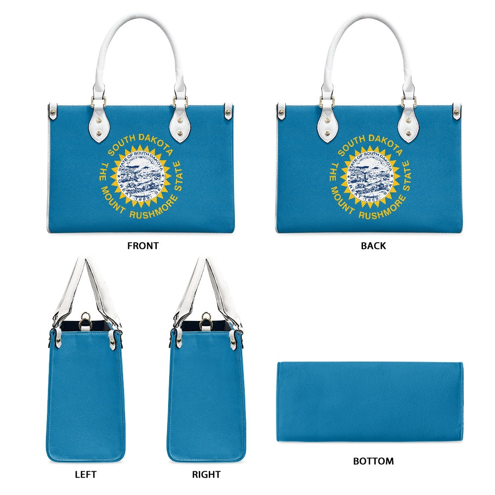 Blue [Brand] handbag with South Dakota emblem design.