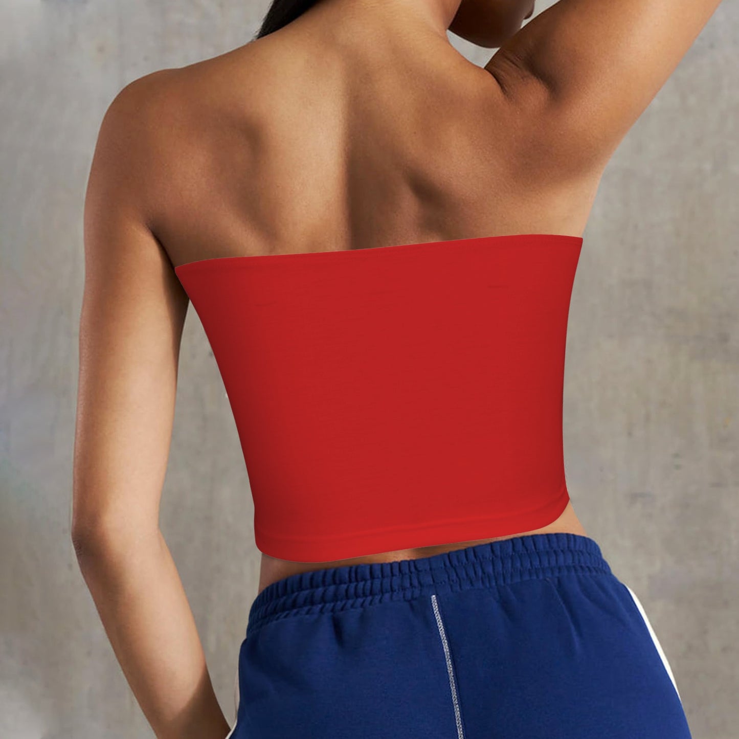 Back view of person in [Brand] red tube top.