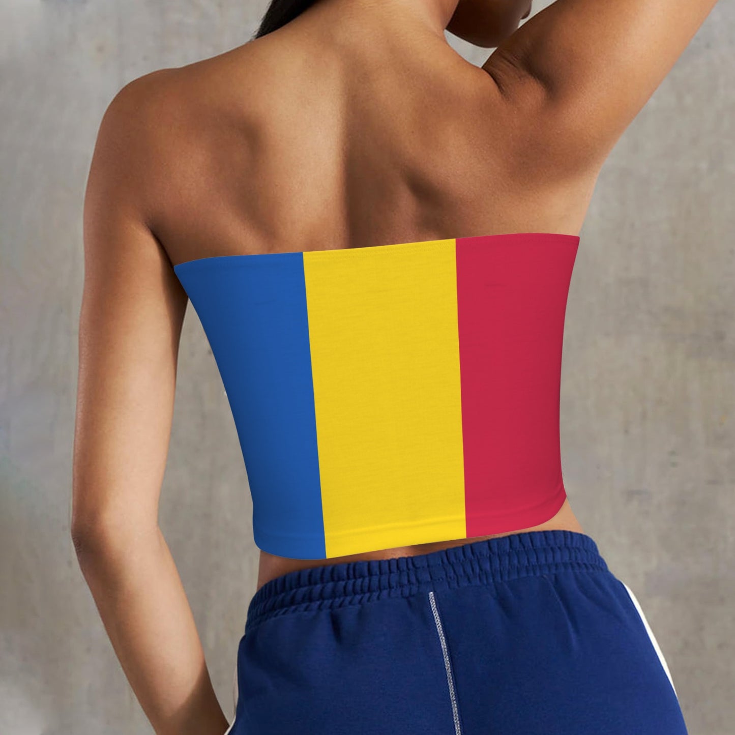 Back view of person wearing [Brand] flag-themed tube top.